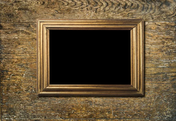 Wooden golden photo frame — Stock Photo, Image