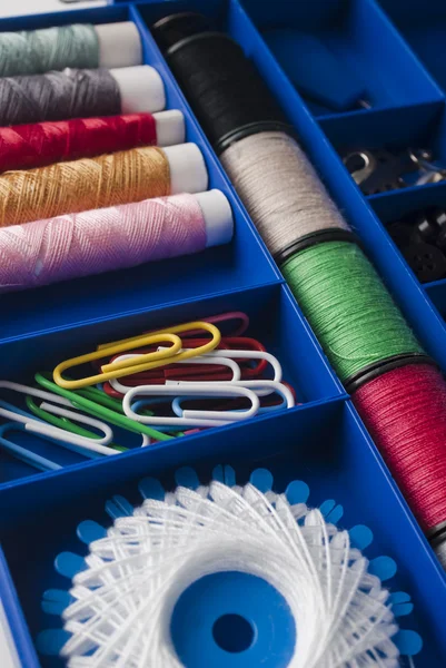 Row of thread spools — Stock Photo, Image