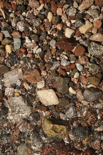 Pebbles in clear water — Stock Photo, Image