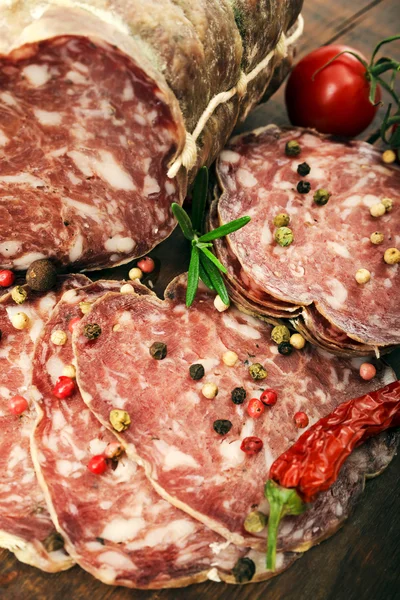 Smoked sausage with pepper and rosemary — Stock Photo, Image