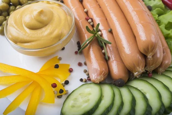 Sausages and fresh vegetables — Stock Photo, Image