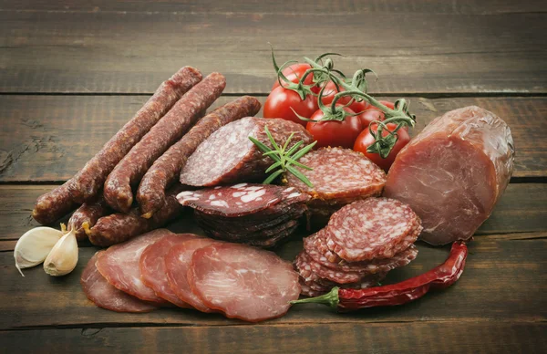 Smoked sausages with spices — Stock Photo, Image