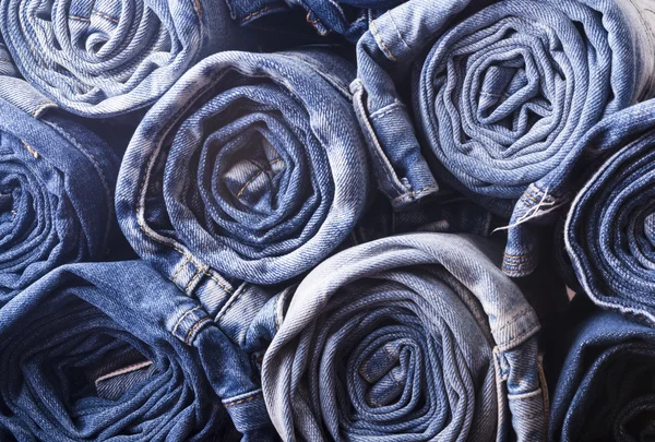 Stacked rolled jeans — Stock Photo, Image