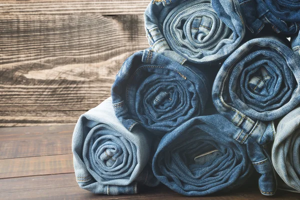 Stacked rolled jeans — Stock Photo, Image