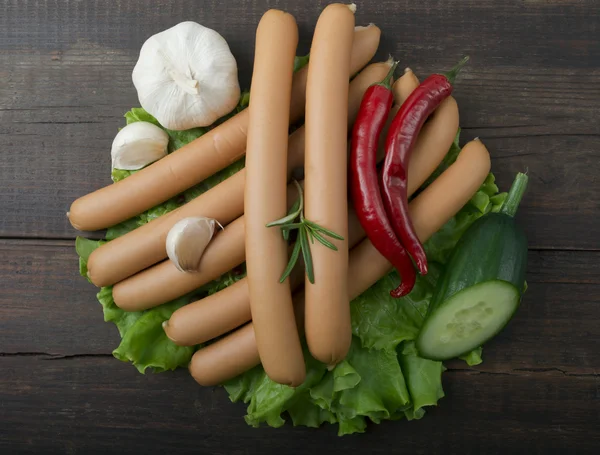 Sausages and fresh vegetables — Stock Photo, Image