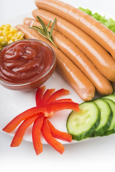 Sausages and fresh vegetables — Stock Photo, Image