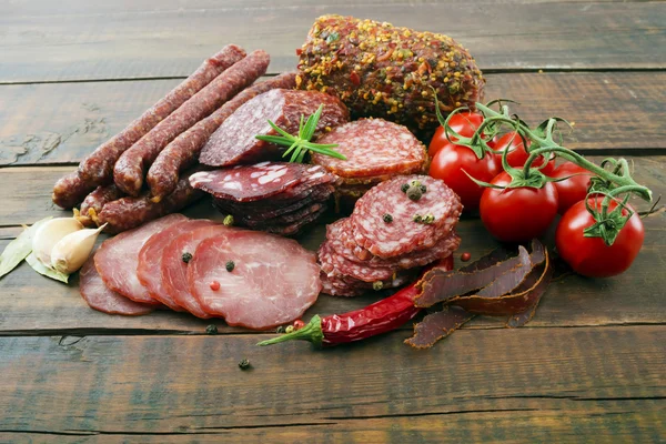 Smoked sausages with rosemary — Stock Photo, Image