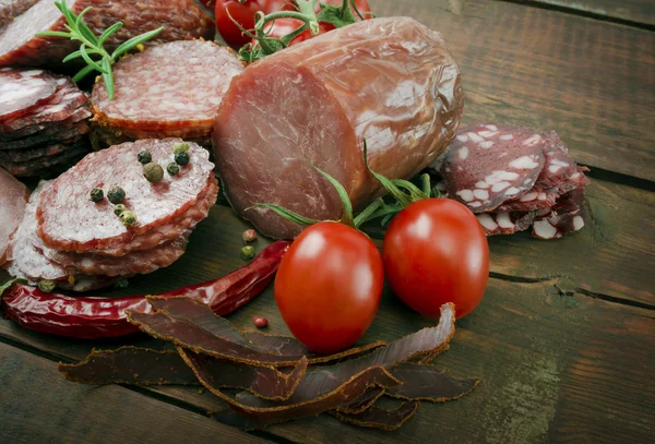 Smoked sausages with rosemary — Stock Photo, Image