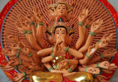 Statue of Quan Am with 1000 eyes and 1000 hands (or Guanyin,Goddess of Mercy) in buddhist temple, Da Lat, Vietnam clipart