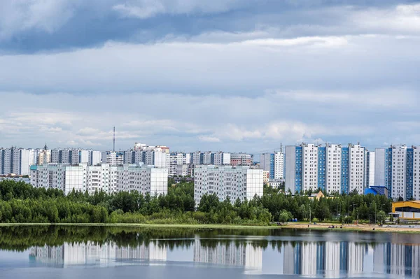 Beautiful view of the lake and urban jungle in Nizhnevartovsk, Russia