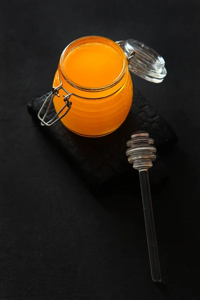 Glass Jar Honey Black Background Vertical Photo Glass Stick Honey — Stock Photo, Image