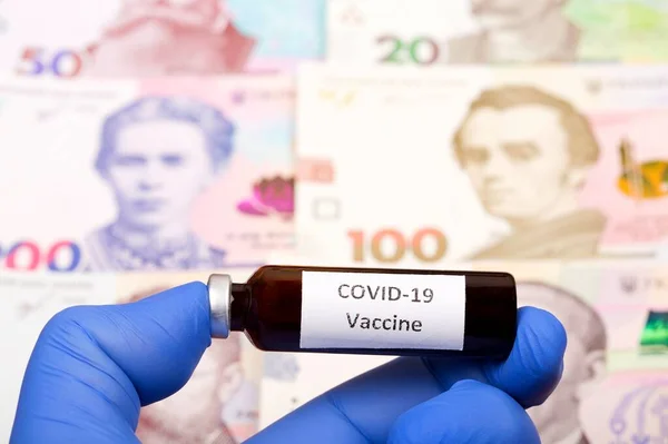 Vaksin Terhadap Covid Dengan Latar Belakang Uang Ukraina — Stok Foto