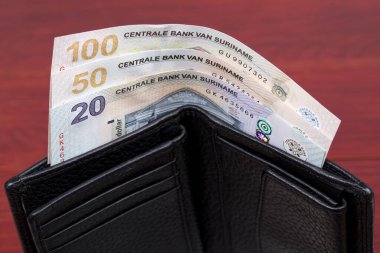 Siyah cüzdanda Surinam Doları