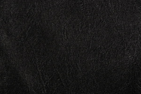 黑色皮革制品，背景 — 图库照片