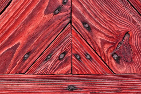 Red boards, a wooden background — Stock Photo, Image