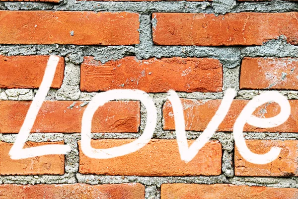 Love - inscription on the wall — Stock Photo, Image