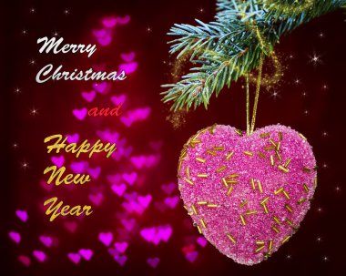 Tebrik kartı pembe kalp ve kelimeler neşeli Noel ve a mutlu yeni yıl