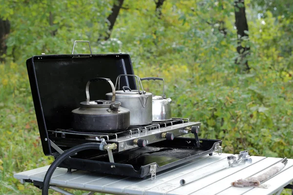 Hervidores de camping en la estufa —  Fotos de Stock