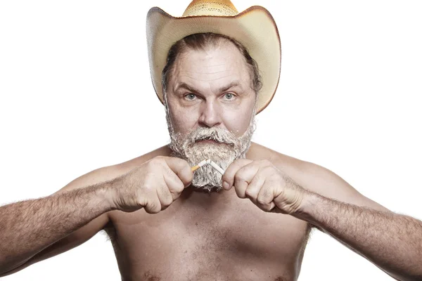 Alter Cowboy gab das Rauchen auf — Stockfoto