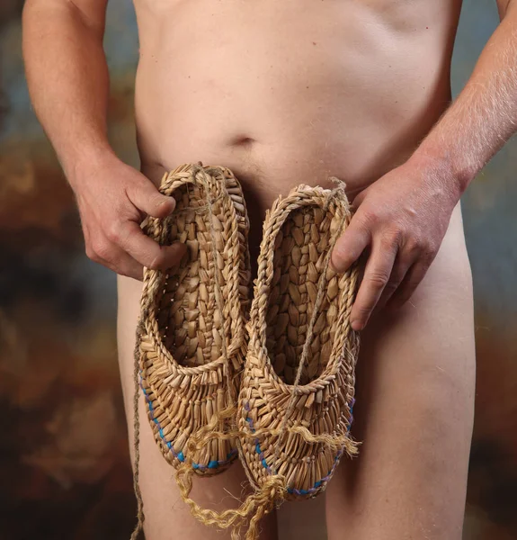 Close Pair Bast Shoes Hands Naked Man Cropped Image Studio — Fotografia de Stock