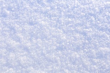 Saf karın güneş ışığındaki makro dokusu