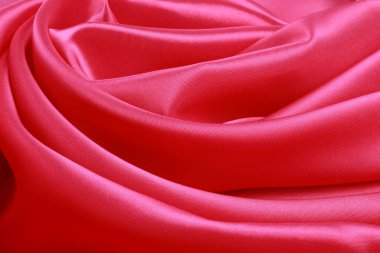 Kırmızı ipek katlanmış gül stüdyosunun makro dokusu 