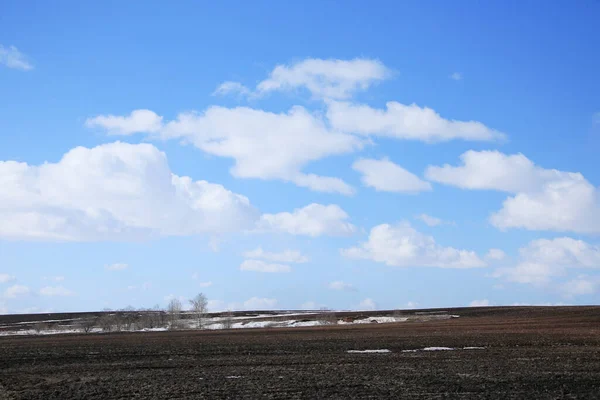 Spring Landscape Snow Melt Field White Clouds Blue Sky Sunny — Stock Photo, Image