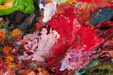 makro ressamın paleti, dokusu farklı renklerde ve doygunluk stüdyosunda karışık yağlı boya.