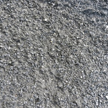 Yakın çekim dokusu, doğal aydınlatma ile izole edilmiş gri taş.