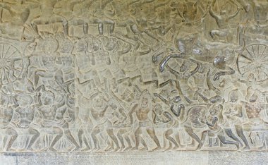 Kamboçya 'daki Angkor Wat Tapınağı' nın eski kaya oymacılarının yakın çekim dokusu.