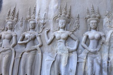 Kamboçya 'daki Angkor Wat Tapınağı' nın eski kaya oymacılarının yakın çekim dokusu.
