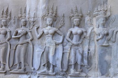 Kamboçya 'daki Angkor Wat Tapınağı' nın eski kaya oymacılarının yakın çekim dokusu.