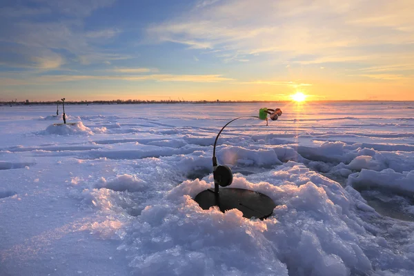 Fishing rod about wells — Stock Photo, Image