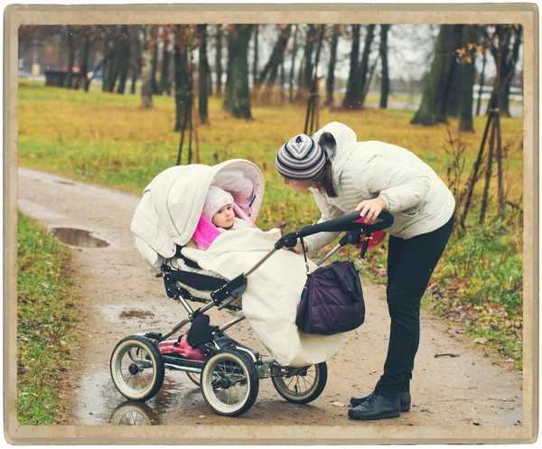 Mother with child nature cold — Stock Photo, Image