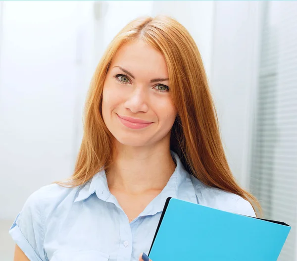 Young woman with office folder — Stock Photo, Image