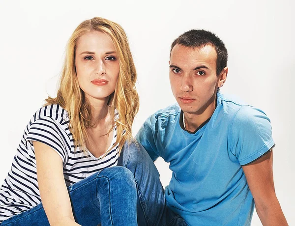 Young Couple posing in studio — Stock Photo, Image