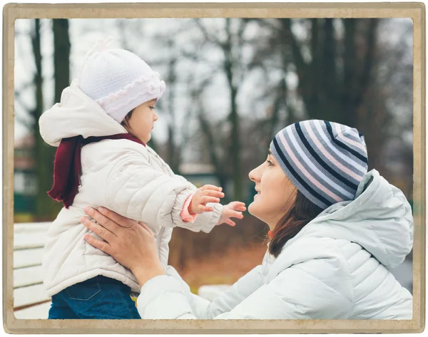 Mother with child outdoors in park — Stock Photo, Image