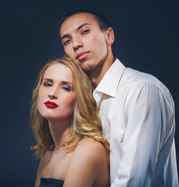 Couple Classic suit black dress woman and man on black background studio with red lipstick and white clothes — Stock Photo, Image