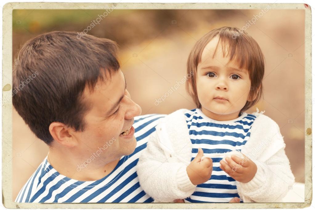 father with child on nature