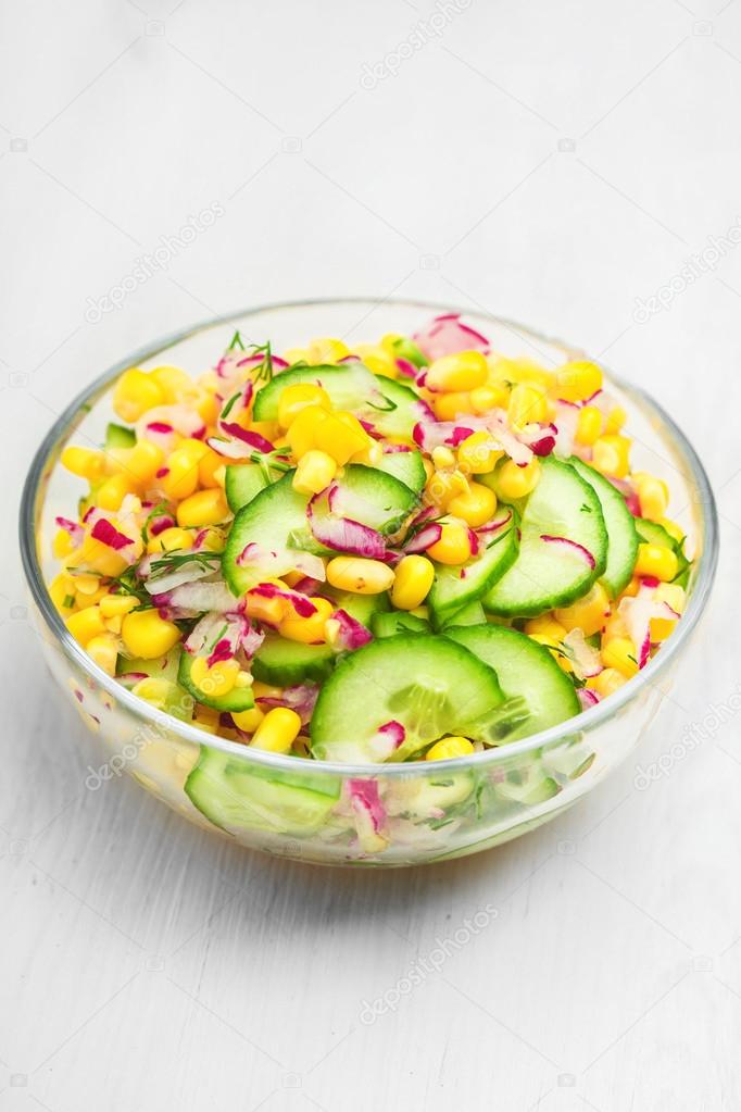 tasty salad with cucumber and corn