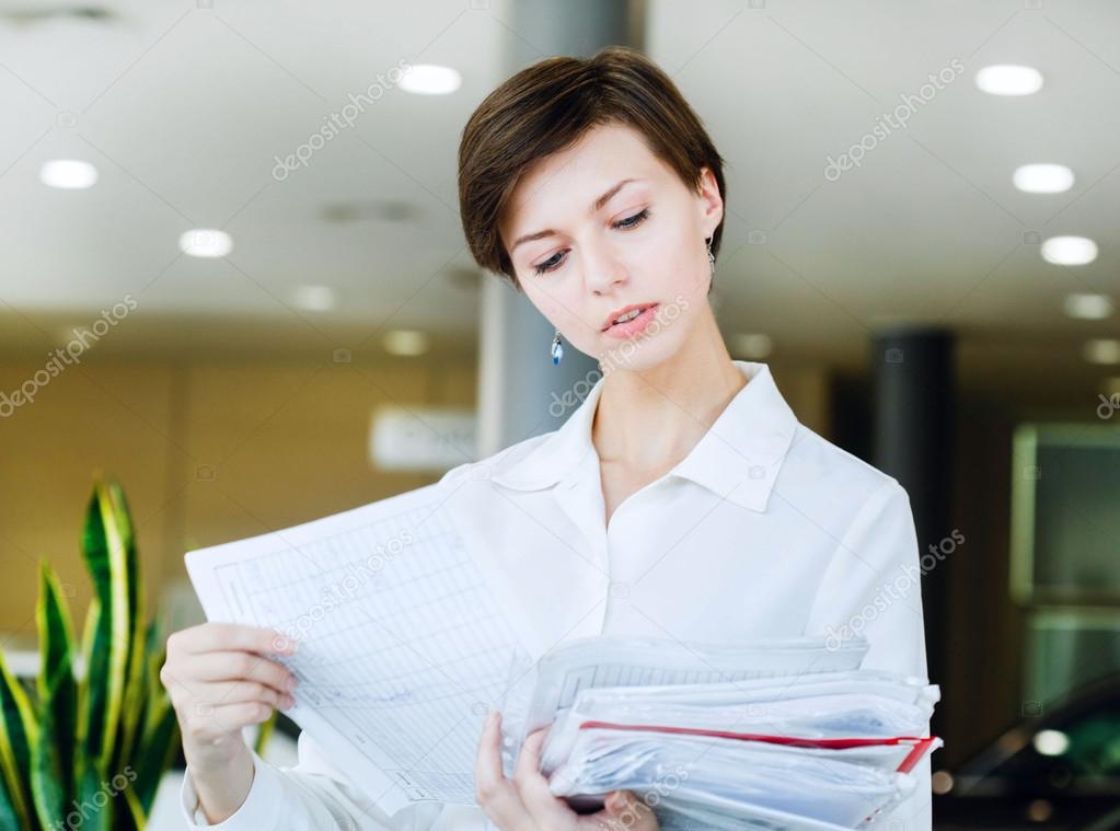 Business woman with hard work stress in office on work place in office  Stock Photo by ©kiraliffe 61853767