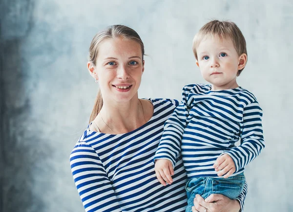 Family Mother Son Boy Same Striped Fashion Clothes Grey Wall — Stock Photo, Image