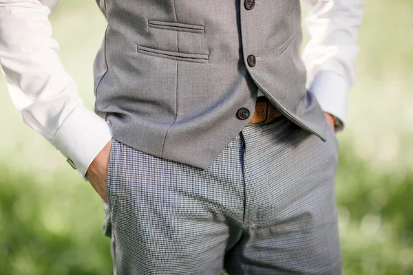 Male hands in his pockets. Groom at the wedding. — Stock Photo, Image