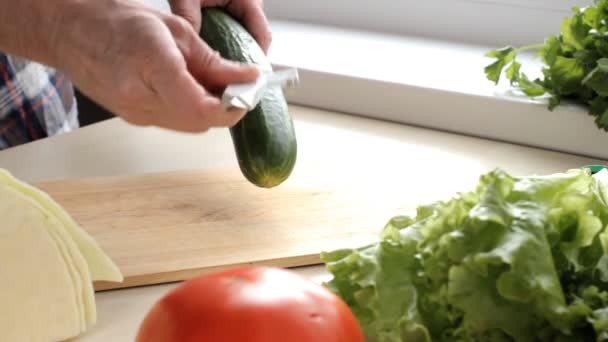 Peeling a cucumber — Stock Video