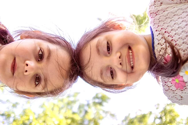 Low angle  portrait of two young girls — Stock Photo, Image