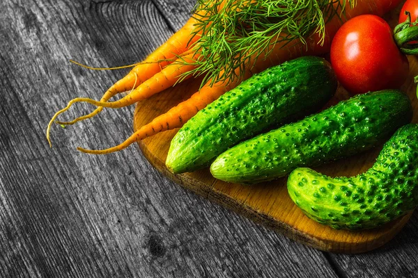 Fresh vegetables on wooden vintage table — Stock Photo, Image