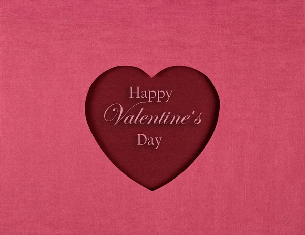 Papirkutt og innskrift Happy Valentines Day. Bakgrunn med kjærlighetssymbolet – stockfoto