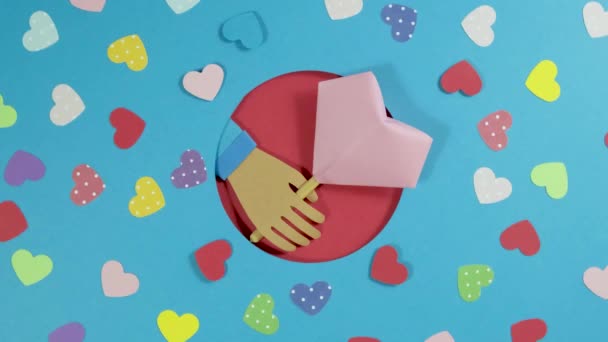 Tournage de fond Saint-Valentin. Résumé de vacances Valentine Arrière-plan avec papier Coeurs. — Video