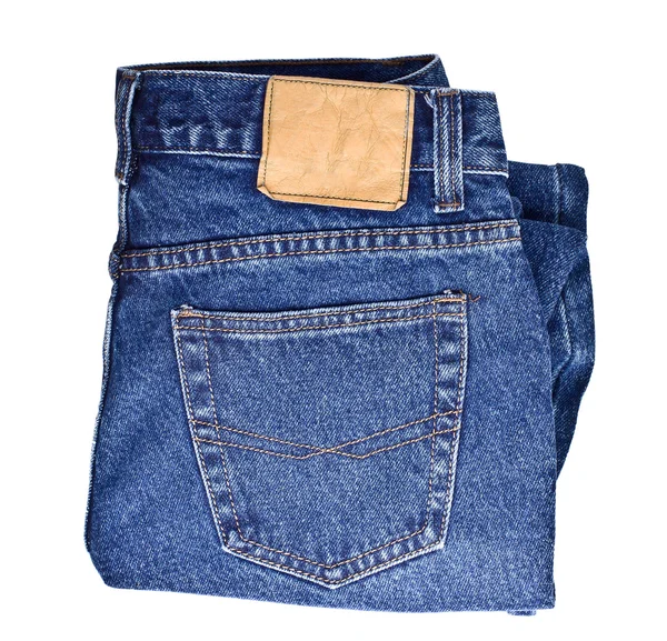 Jeans pano azul sobre um fundo branco — Fotografia de Stock