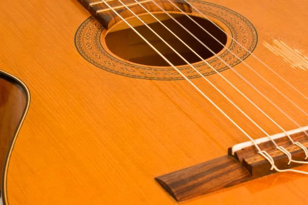 The image of a classical guitar closeup — Stock Photo, Image